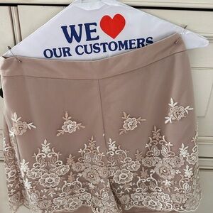 Lauren Conrad beige and white flowers dress shorts. Never worn, brand new!